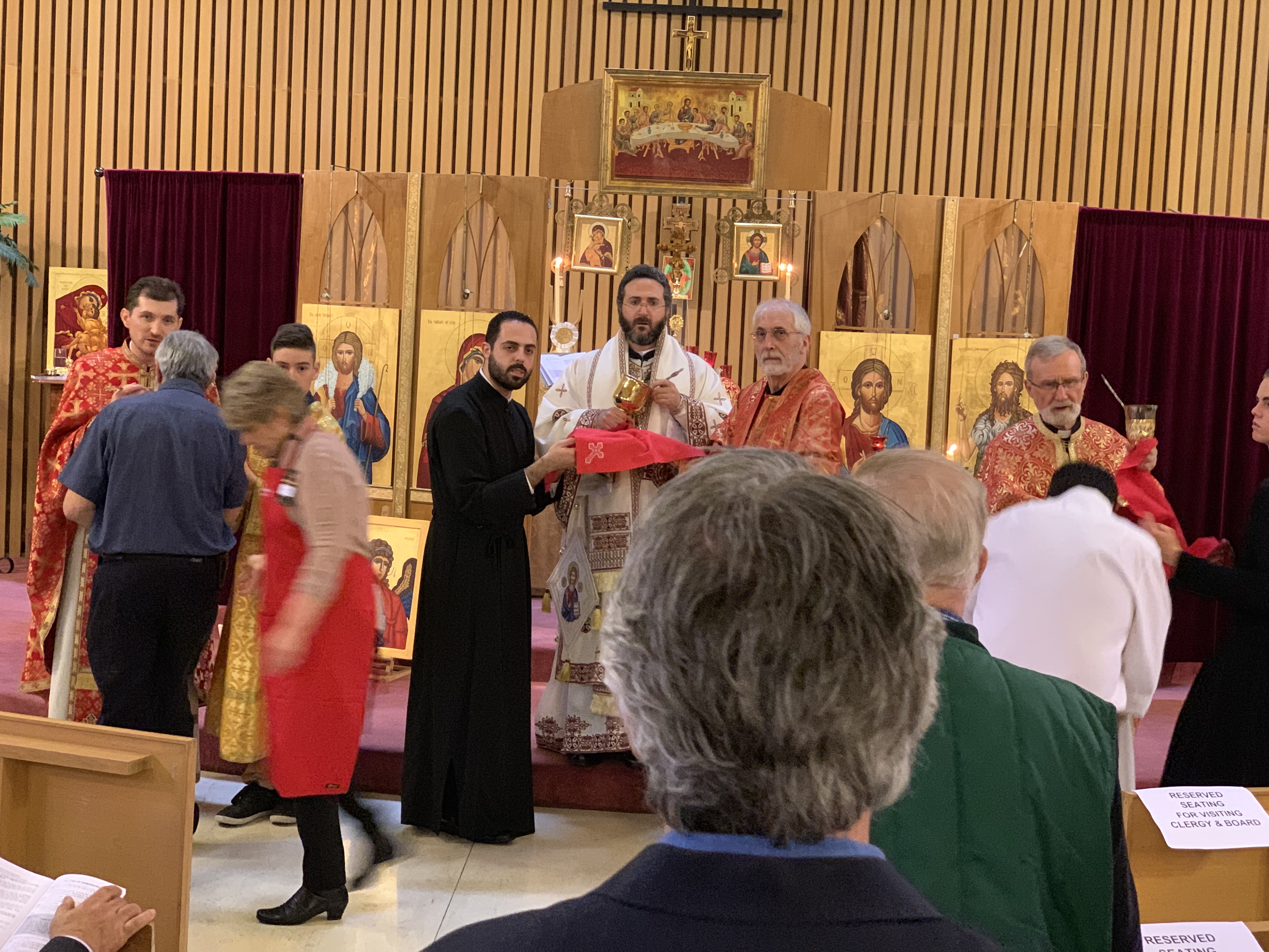 Communion served by Metropolitan Basilios at The Good Shepherd