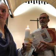 Fr. Geoff and the baptismal candidate