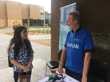 Fr. Geoff welcomes a new Monash student
