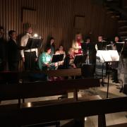 The choir, singing in the dark